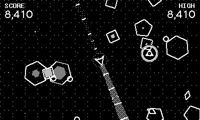 Gameplay: the laser sweeping past hexagons and pentagons closing on the core